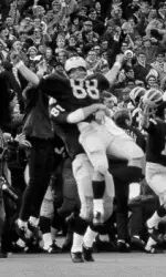 Mandich (88) celebrates the 1969 upset of top-ranked Ohio State