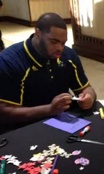 Chris Bryant makes holiday cards for the troops