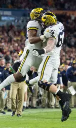 Khalid Hill (left) celebrates his touchdown with Kyle Kalis