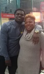 Jabrill Peppers and his mother, Ivory Bryant, enjoy a moment together near the Heisman Trophy