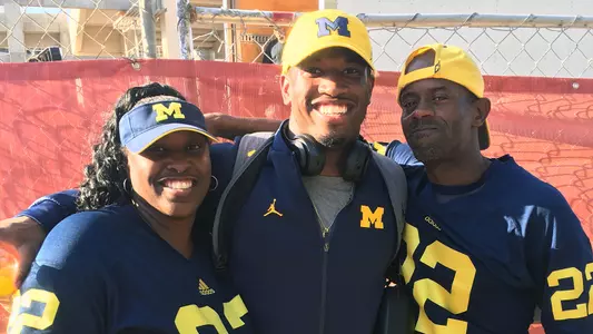 Karan Higdon and Parents