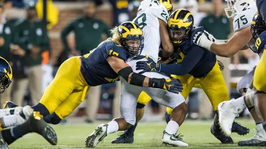 Chase Winovich and Mike McCray