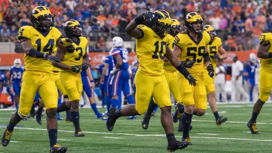 Josh Metellus (14), Rashan Gary (3), Devin Bush (10)