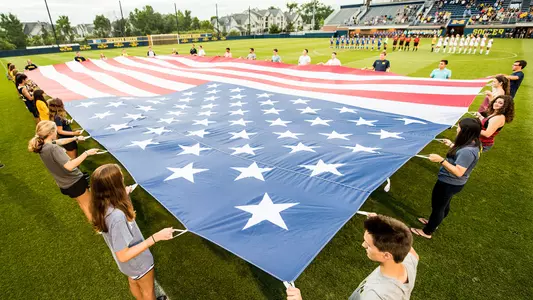 Women's soccer flag pregame