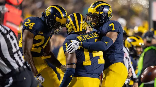 Football Defense Celebration vs. Wisconsin
