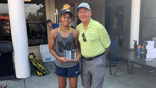 Nicole Hammond (left) and Dick Vitale