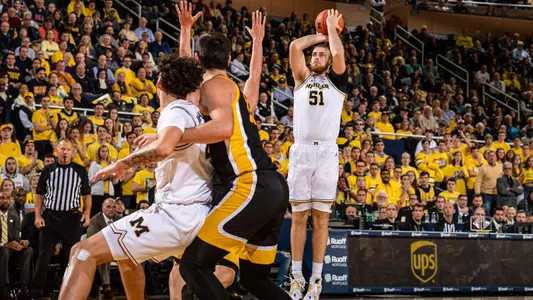 Austin Davis, Brandon Johns Jr. (Michigan Photography)