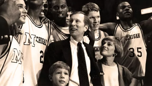 Steve Fisher, family and team celebrate 1989 regional title