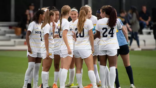 Women's Soccer Team Huddle Generic