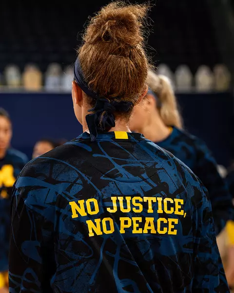 Social Justice: Women's Basketball Warmup - No Justice, No Peace