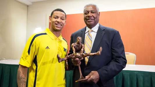 Trey Burke (left) and Oscar Robertson