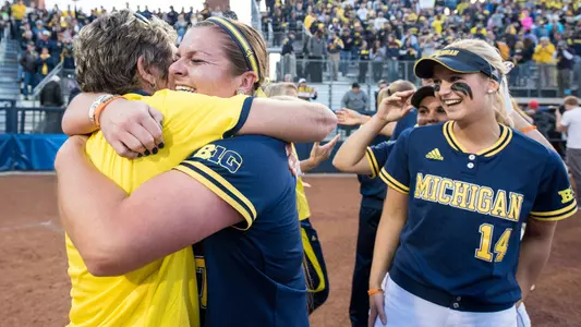 Carol Hutchins and Haylie Wagner embrace after Super Regional