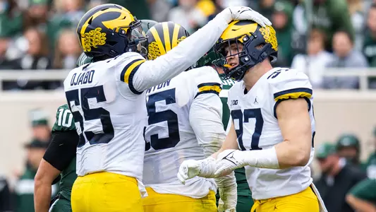 From left: David Ojabo, Christopher Hinton, Aidan Hutchinson