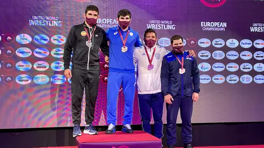 Myles Amine (third from left - no credit)