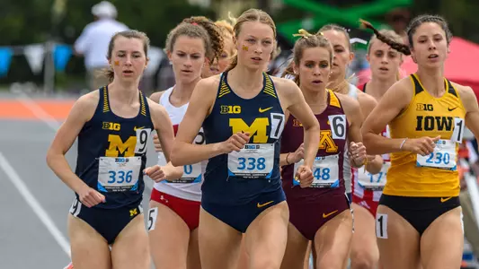 Aurora Rynda (center), Lucy Petee (left; Big Ten Conference photo)