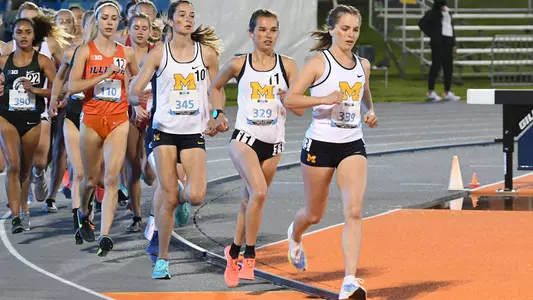 Jessi Larson (second from right, Big Ten Conference photo)