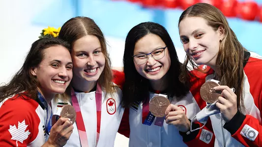 Maggie MacNeil (second from right)