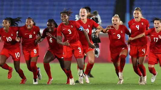 Jayde Riviere (8) and Shelina Zadorsky (4) celebrate Canada's first Olympic title