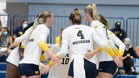 Volleyball Team Huddle Generic (U-M Athletic Communications)