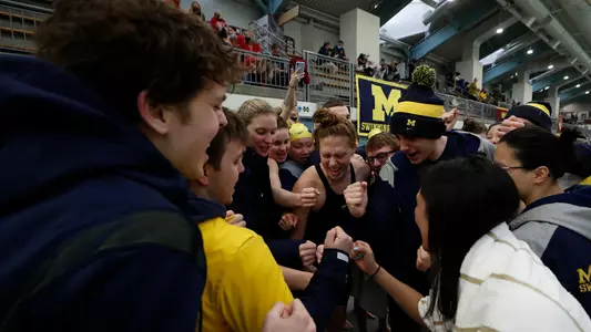 Women's Swimming and Diving Team Huddle