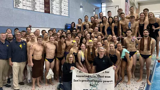 Women's Swimming and Diving Team Huddle at Be Better; Invite (U-M Athletic Communications)