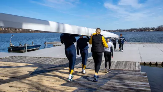 Rowing Carrying the Boat