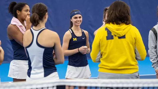 Women's Tennis huddle