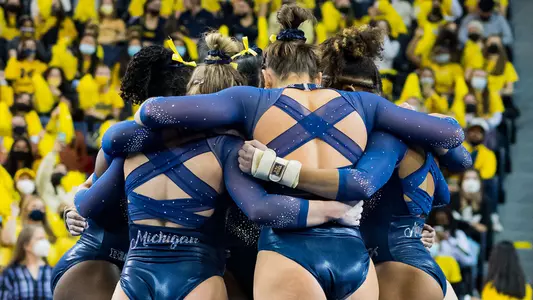 Women's gymnastics huddle generic