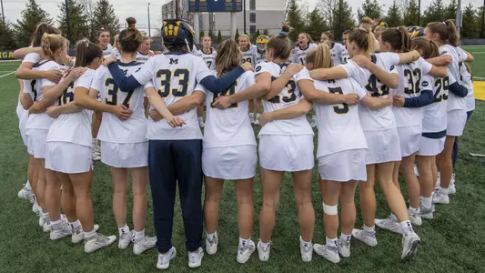 Women's lacrosse team huddle generic