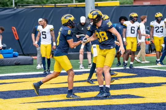 Ronnie Bell and Peyton O'Leary celebrate a touchdown