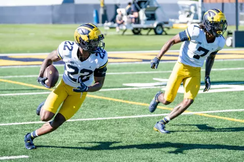 Gemon Green intercepts a pass during practice
