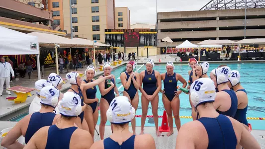 Water Polo Team Huddle (U-M Athletic Communications)