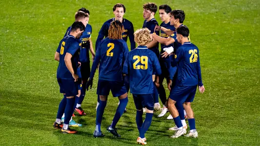 Men's Soccer Team Huddle