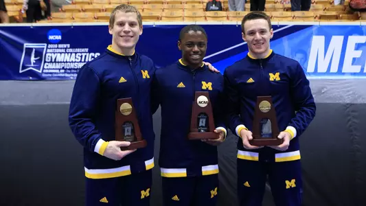 All-Americans (from left) Colin Mahar, Anthony McCallum, Dmitri Belanovski