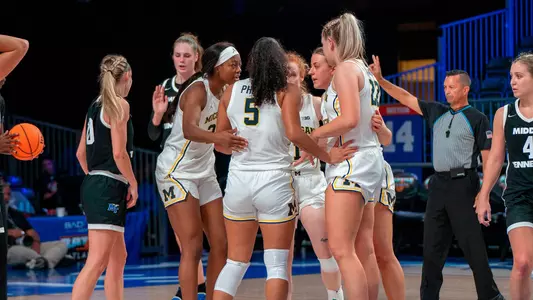 Women's Basketball Group Huddle (U-M Athletic Communications)