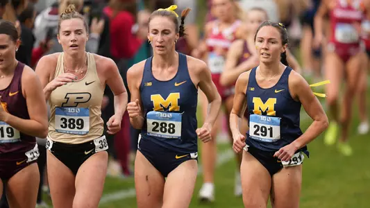 Samantha Hastie, center, and Lisa Luecke