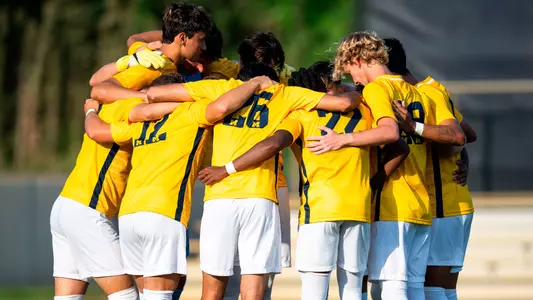 Men's Soccer Team Huddle