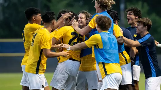 Men's soccer team celebration