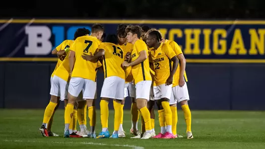 Men's Soccer Team Huddle