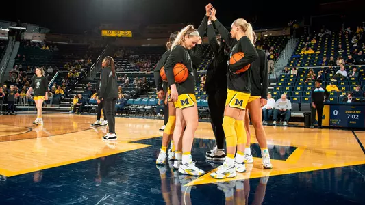 Women's Basketball Team Huddle