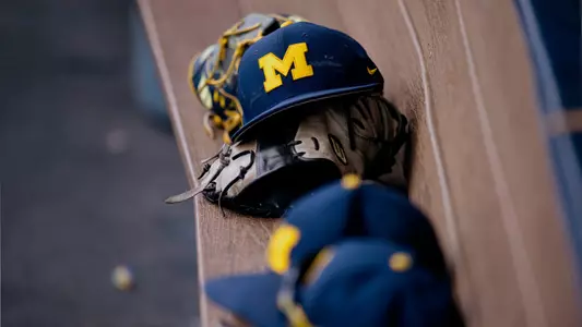 Baseball Hats and Gloves in Dugout