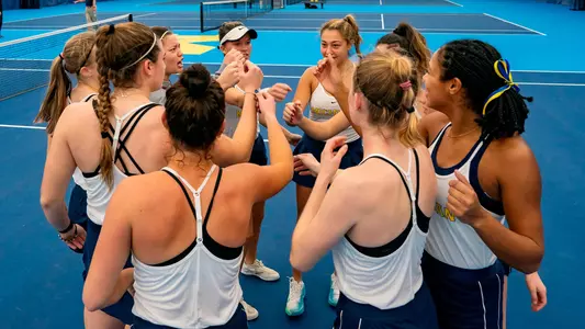 Women's Tennis Team Huddle