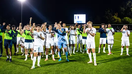 Men's soccer postgame celebration