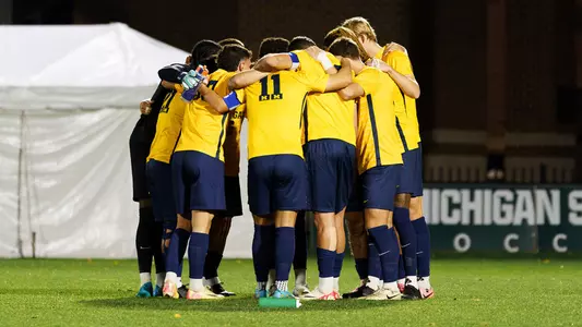 Men's Soccer Team Huddle