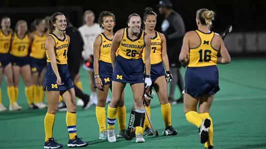 Abby Tamer, left, Lora Clarke, center, and Kate McLaughlin, right