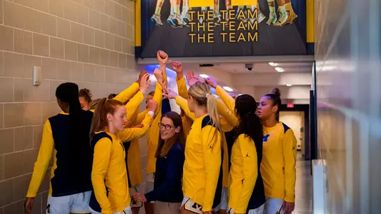Women's Basketball Huddle in the Tunnel
