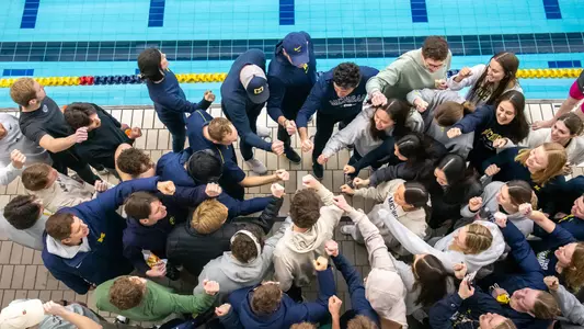 Swimming and Diving Team Huddle