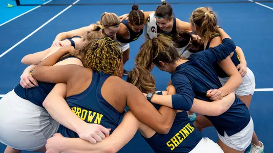 Womens' Tennis Team Huddle