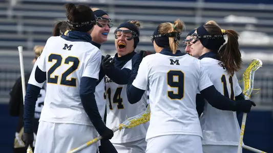 Women's lacrosse team celebration