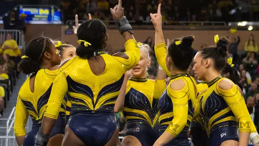 Women's Gymnastics team huddle